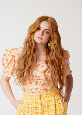 Ariel Winter in Floral Top and Yellow Skirt