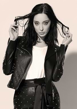 Emma Dumont in Studded Leather Jacket and Pants