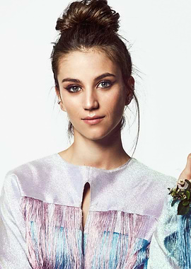 Claudia Salas with Messy Bun and Fringed Top