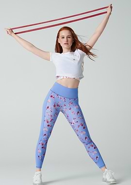 Madelaine Petsch exercising with resistance bands