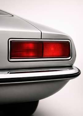 Close-up of a vintage car's taillight - Grand Tourer