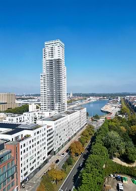 Modern Cityscape with Tall Buildings and Waterway