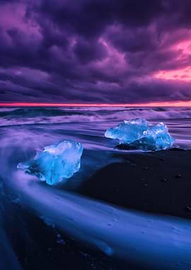 Icebergs on a Black Sand Beach at Sunset