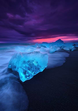 Icebergs on Black Sand Beach at Sunset