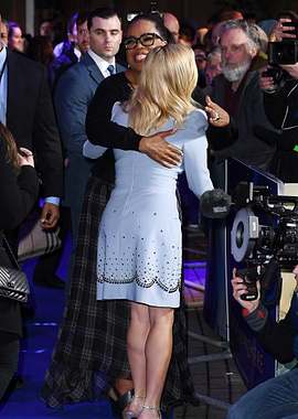Oprah Winfrey hugs Reese Witherspoon
