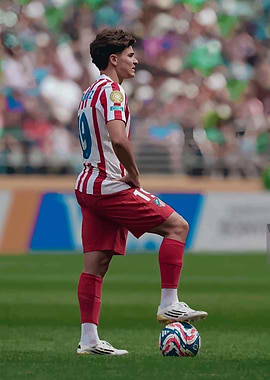 Julian Alvarez Soccer player with ball on field