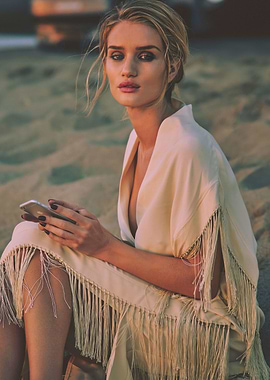 Rosie Huntington-Whiteley on Beach with Phone