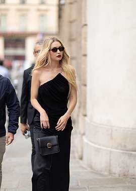 Gigi Hadid in a black one-shoulder dress