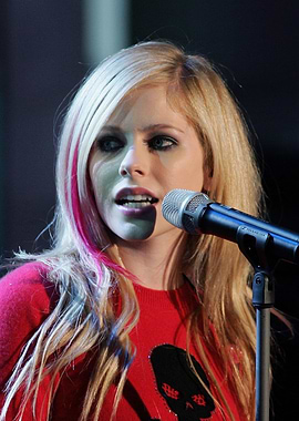 Avril Lavigne Singing into Microphone