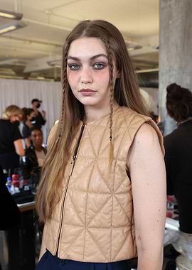 Model with braided hair and makeup