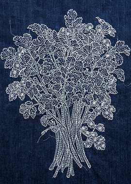 White Embroidery of a Floral Bouquet on Denim
