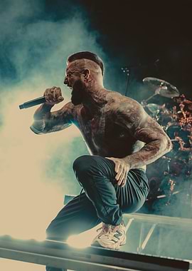 Tattooed Musician Performing on Stage