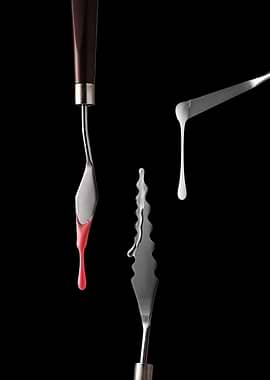 Art palette knives with paint drips