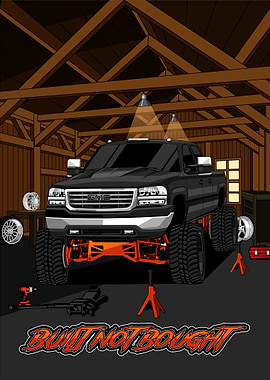 Custom Lifted GMC Truck in Garage