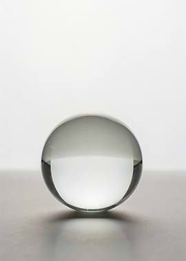 Clear Glass Sphere on Surface
