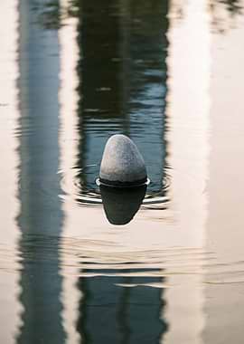 Zen Stone Reflection in Water