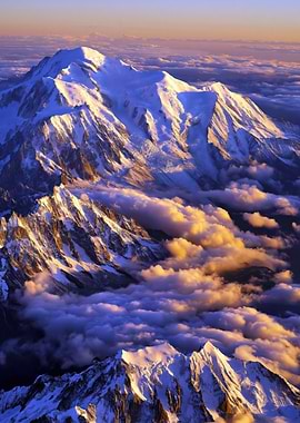 Majestic Snow-Capped Mountains at Sunrise