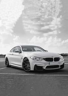 White BMW M4 Coupe on Asphalt