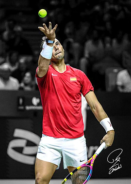 Rafael Nadal Serving Tennis Ball