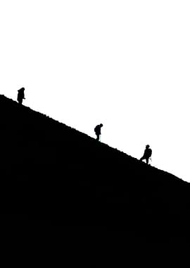 Hikers on a steep mountain slope