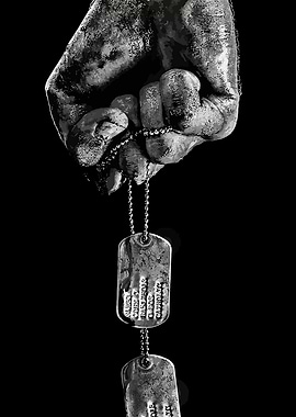 Fist Holding Dog Tags