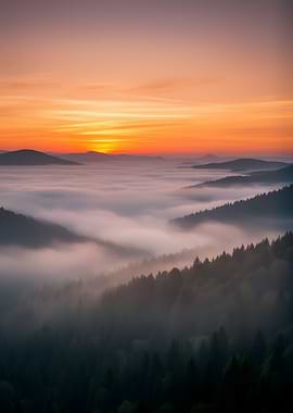 Sunrise over foggy mountains