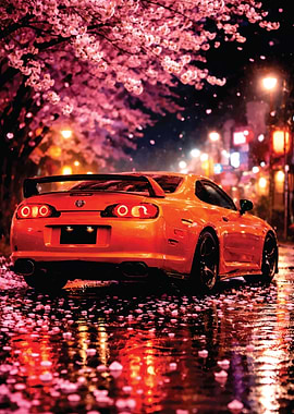 Orange sports car under cherry blossoms