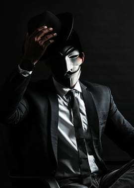 Man in Guy Fawkes Mask and Fedora