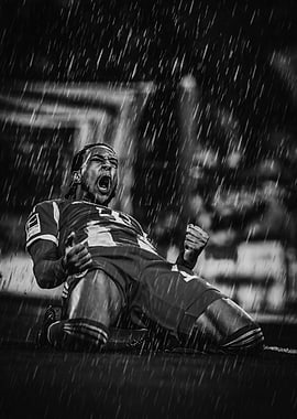 Soccer Player Celebrating in the Rain