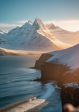 Snowy Mountains Overlooking the Ocean
