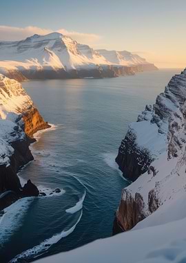 Snowy Mountains Overlooking a Coastal Inlet