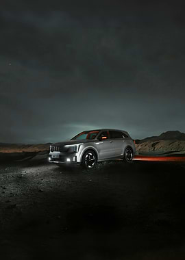Silver SUV at Night in Desert