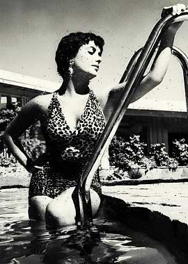 American actress Elizabeth Taylor in a swimming pool