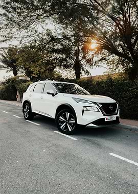 White Nissan X-Trail on a Road