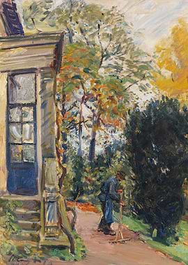 Gardener Raking Leaves by a House