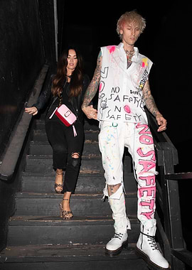 Megan Fox and Machine Gun Kelly on Stairs