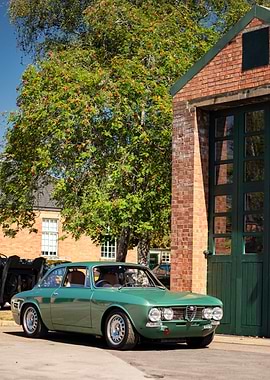 Green Alfa Romeo Coupe by Brick Building