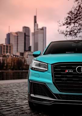 Turquoise Audi SQ2 in Cityscape