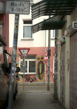 Urban Alley with Graffiti and Signs