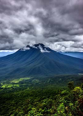 Volcano shrouded in dramatic clouds