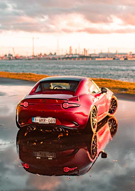 Red Mazda MX-5 Miata on Wet Road