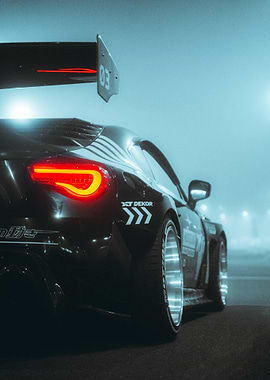 Tuned Black Sports Car at Night