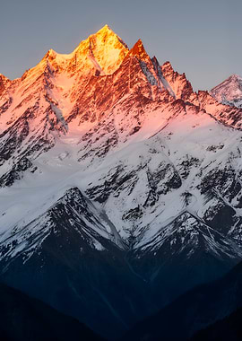 Sunrise on Snow-Capped Mountains