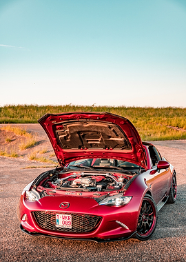 Red Mazda MX-5 with Hood Open