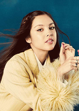 Olivia Rodrigo in Yellow Coat