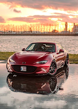 Red Mazda MX-5 Miata at Sunset