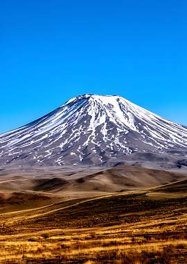 Snow-capped Volcano Under Blue Sky