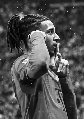 Football Player with Dreadlocks Gesturing Silence