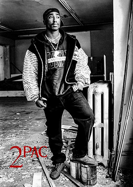 Tupac Shakur standing in abandoned building