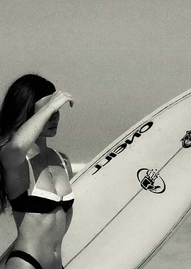 Woman with Surfboard on Beach